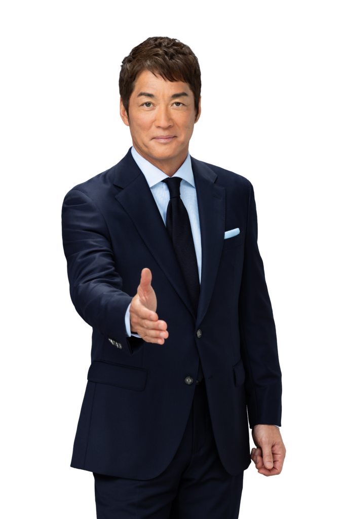 手を差し出すスーツ姿の長嶋一茂